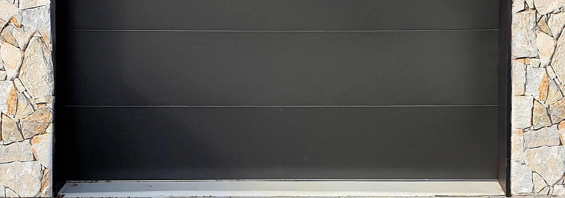 Overhead Black Garage Door Installation in Tamarac, Florida